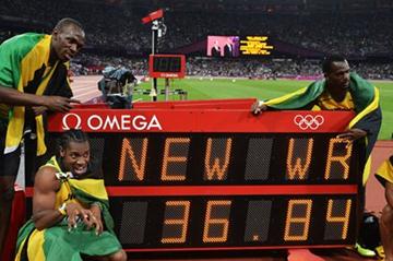 Winning Jamaican team: Usain Bolt, Yohan Blake, Michael Frater and Nesta Carter next to the clock showing the new world record of 36.84 in the Men's 4 x 100m Relay Final of the London 2012 Olympic Games on August 11, 2012 (Getty Images)