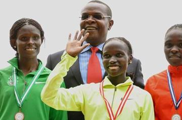 Sally Kipyego, Vivian Cheruiyot and Joyce Chepkirui in Nairobi with Kenyan Sports Minister Dr. Paul Otuoma (Muthoni Njuki, Capital FM)