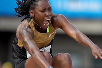 Brittney Reese sailing to a 7.15m world lead in Eugene (Getty Images)