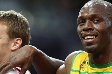 Usain Bolt of Jamaica puts his arm on the shoulder of Christophe Lemaitre of France after his Men's 200m Semifinals on Day 12 of the London 2012 Olympic Games on 8 August 2012 (Getty Images)