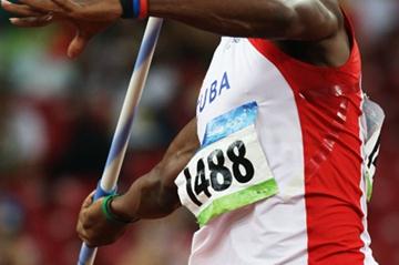 Yordani Garcia of Cuba produces the furthest javelin throw of the first group in the decathlon (Getty Images)