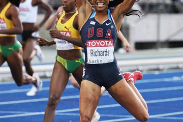 Sanya Richards celebrates as she crosses the line to win her first 400m global title at the 12th IAAF World Championships in Athletics (Getty Images)