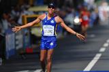 Luis Fernando Lopez of Colombia celebrates winning bronze in the 20km race walk as Russians Borchin and Kanaykin celebrate gold and silver respectively (Getty images)