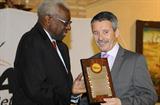 IAAF Dinner, Punta Umbria - José Francisco Pérez Moreno, Andalucian Regional Government Representative receives an IAAF Plaque from IAAF President Lamine Diack (l) (Getty Images)