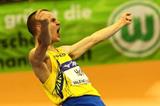 Stefan Holm celebrates his winning clearance in the high jump final (Getty Images)