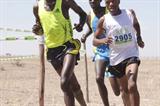 Mukundi Mwangi (right) on his way to winning Kenyan Police Administrative XC Champs title (Stafford Ondego, The Standard)