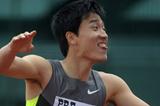 Liu Xiang celebates his stunning 12.87 windy victory in Eugene (Kirby Lee - Image of Sport)