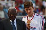 Christophe Lemaitre of France receives his 200m gold medal from IAAF President Lamine Diack (Getty Images)