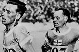 Vilho Ritola leads Paavo Nurmi in the 5000m at the 1928 Amsterdam Olympics (Getty Images)