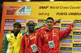 Ayad Lamdassem of Spain with Meselech Melkamu (ETH) and Linet Chepkurui (KEN) at the IAAF World Cross Country Championships Press Conference in Punta Umbria (Getty Images)