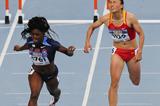 Morgan Snow of United States celebrates running for Gold Medal ahead of  Dou Wang of China during the Women's 100 metres hurdles Final on day six of the 14th IAAF World Junior Championships in Barcelona on 15 July 2012 (Getty Images)