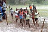 Pauline Korikwiang (red vested, far left of the front trio) running the 8km XC in Machakos, Kenya (Elias Makori)