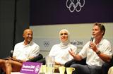 Namibian sprinter Frank Fredericks (left), with fellow Olympians Egyptian swimmer Rania Elwani and French cyclist Frederic Magne at Chat with Champions at the Youth Olympic Village in Singapore (SPH-SYOGOC/ Dominic Wong)