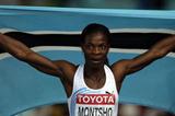 Amantle Montsho of Botswana celebrates with her country's flag after winning the women's 400 metres final  (Getty Images)