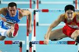 (L-R) Emanuel Abate of Italy and Lui Xiang of China competes in the Men’s 60 Metres Hurdles semi final during day three - WIC Istanbul  (Getty Images)