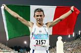 Baldini parades the Italian flag after his Olympic marathon win (Getty Images)