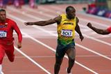 Usain Bolt of Jamaica crosses the finish line ahead of Ryan Bailey of the United States and Justin Gatlin of the United States to win the Men's 100m Semifinal on Day 9 of the London 2012 Olympic Games on 5 August 2012 (Getty Images)