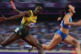 Kerron Stewart (L) of Jamaica and Elyzaveta Bryzgina of Ukraine race to the finish line during the Women's 4 x 100m Relay Round 1 of the London 2012 Olympic Games on 9 August 2012 (Getty Images)