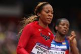Sanya Richards-Ross of the United States runs alongside Norma Gonzalez of Colombia in the Women's 200m heat on Day 10 of the London 2012 Olympic Games on 6 August 2012 (Getty Images)