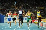 LaShawn Merritt of the USA crosses the finish line ahead of L.J. van Zyl of South Africa to claim victory in the men's 4x400 metres relay final (Getty Images)