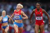 (L-R) Antonina Krivoshapka of Russia and DeeDee Trotter of the United States compete in the Women's 400m Semi Final on Day 8 of the London 2012 Olympic Games on 4 August 2012 (Getty Images)