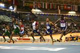 Olusoji Fasuba stretches away from the rest of the field to win the men's 60m title (Getty Images)