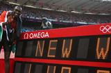 David Lekuta Rudisha of Kenya celebrates next to the clock after winning gold and setting a new world record in the Men's 800m Final on Day 13 of the London 2012 Olympic on 9 August 2012 (Getty Images)