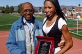 Allyson Felix with her grandfather, Dr. Whalen S. Jones, who recently celebrated his 100th birthday