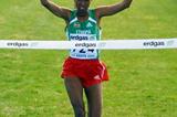 Werknesh Kidane raises her hands in triumph as she wins the women's long course (Getty Images)