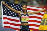 Allyson Felix celebrates successfully defending her 200m World Championship title at the 12th IAAF World Championships in Athletics