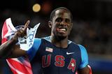 Dwight Phillips of the USA celebrates victory in the men's long jump final