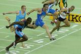 Jason Gardener (GBR) dips to the line to win the 60m World title (Getty Images)