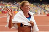 Constantina Tomescu-Dita celebrates her Olympic marathon victory (Getty Images)