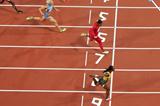 Carmelita Jeter of the United States and Veronica Campbell-Brown of Jamaica lead the pack in the Women's 200m Semifinals on Day 11 of the London 2012 Olympic Games at Olympic Stadium on August 7, 2012  (Getty Images)