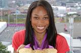Allyson Felix with collection of London gold