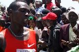 Bedan Karioki crosses the finish line to win gold in the 12 KM Senior Men category at the 2012 KCB National Cross Country Championships  (Credit Ogilvy Communications)