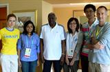 Left to right: Iuliia Vynokurova of Ukraine; Sonali Prasad of India; President Diack; See Kit Tang of Singapore; Ji Ye of China; Alan Abrahamson, Young Reporter trainer, United States (Freelance)