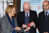 From left : Anna Riccardi member of IAAF Council, Roberto L. Quercetani and Alberto Morini Deputy Vice President FIDAL, taken in Florence - Salone dei Cinquecento - Palazzo Vecchio. March 2012 (FIDAL)