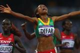 Meseret Defar of Ethiopia crosses the finish line and win gold in the Women's 5000m Final  of the London 2012 Olympic Games  on August 10, 2012 (Getty Images)