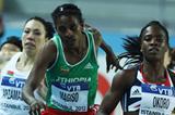 Fantu Magiso of Ethiopia stumbles as she Marilyn Okoro of Great Britain competes with in the Women's 800 Metres first round during day one - WIC Istanbul (Getty Images)