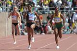 Carmelita Jeter outsprints Shelly Ann Fraser in the 4x100 at the Penn Relays (Kirby Lee)