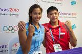 Angelica Bengtsson with Timothy Tay Kai Cheng, the flag bearer for Singapore in the YOG Opening Ceremony (Volker Minkus)