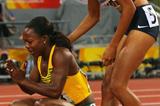 Allyson Felix congratulates Olympic champion Veronica Campbell-Brown after finishing second in Beijing